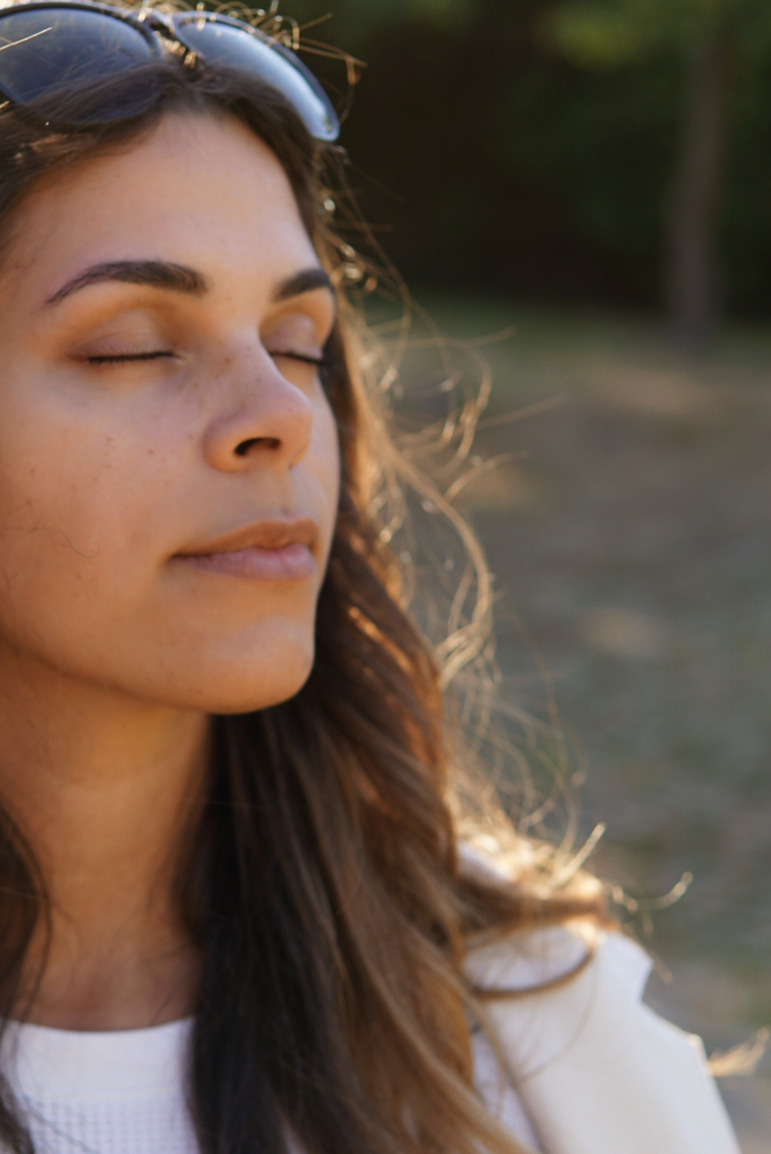 Shoshana with closed eyes in soft evening light